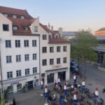 View from our hotel room in Munich looking down at outdoor cafes